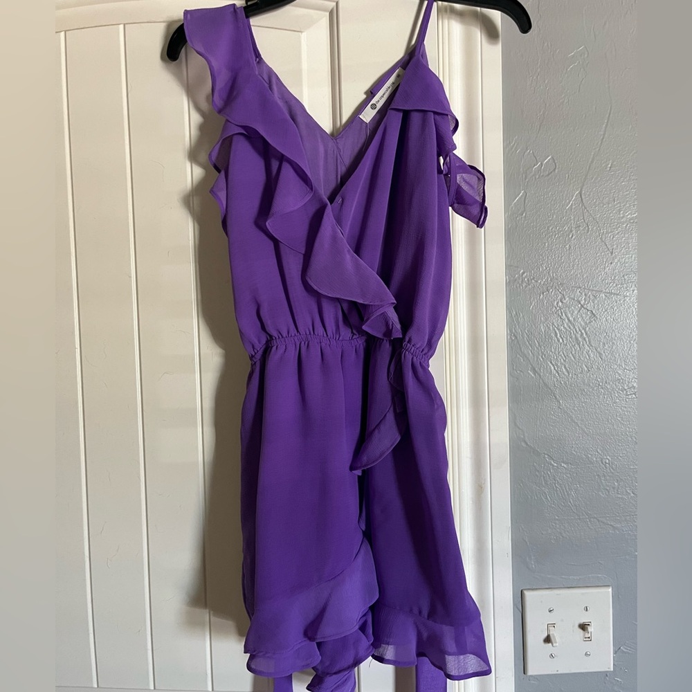 Purple Romper with ruffle detail